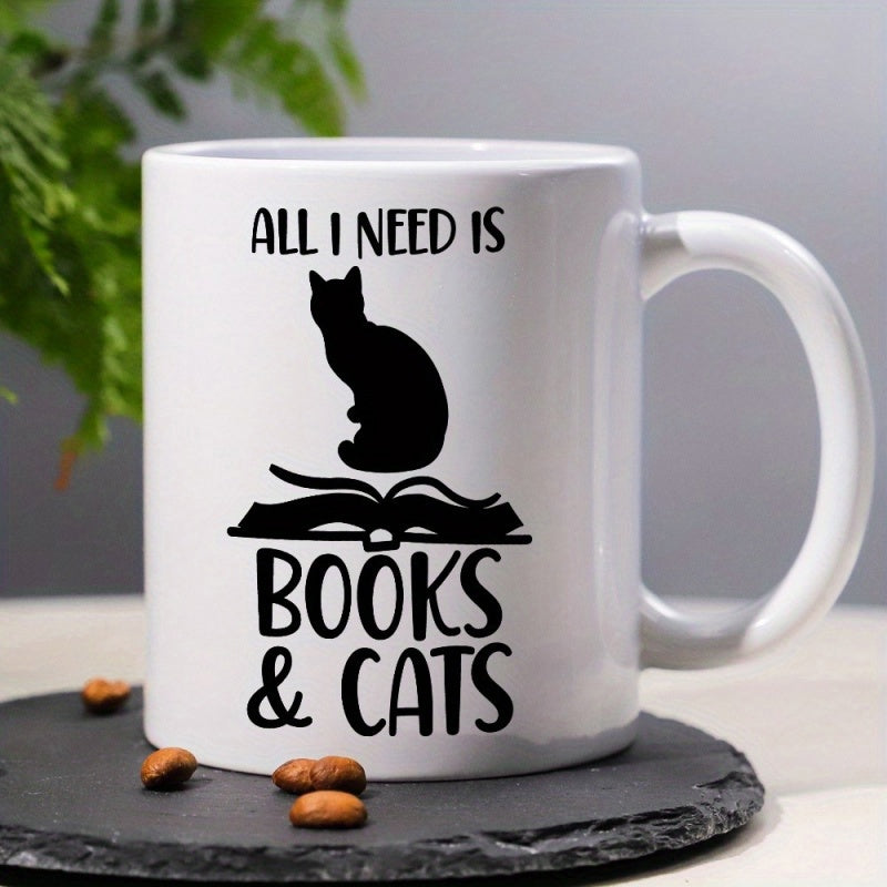 Tailorly White Ceramic 11 oz Mug - All I Need Is Books Cats Minimalist Black Silhouette Resting Atop A Wide Open Knowledge Filled Book Cat