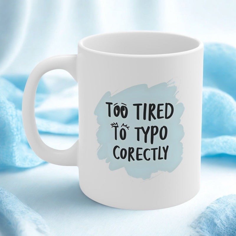 Tailorly White Ceramic 11 oz Mug - Too Tired To Typo Corectly Humorous Quote Within Light Blue Artistic Brushstroke On
