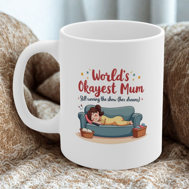 Tailorly White Ceramic 11 oz Mug - World's Okayest Mum Still Running The Show Her Dreams Cartoon Character Of A Tired Woman Resting On A Blue Comfortable Couch