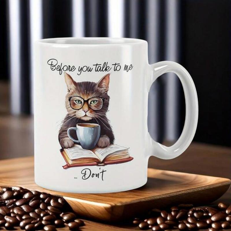 Tailorly White Ceramic 11 oz Mug - Before You Talk To Me Don't Smart Tabby Cat Wearing Glasses Holding Coffee Cup Above Open Book Cat