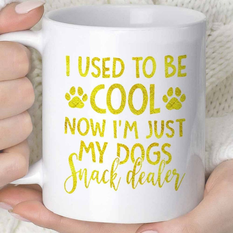 Tailorly White Ceramic 11 oz Mug - I Used To Be Cool Now I'm Just My Dogs Snack Dealer Distressed Yellow Typography Featuring Small Paw Prints Among Decorative