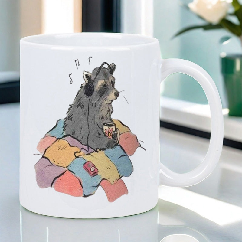 Tailorly White Ceramic 11 oz Mug - Adorable Small Animal Listening To Music Resting On Colorful Soft Quilt Raccoon