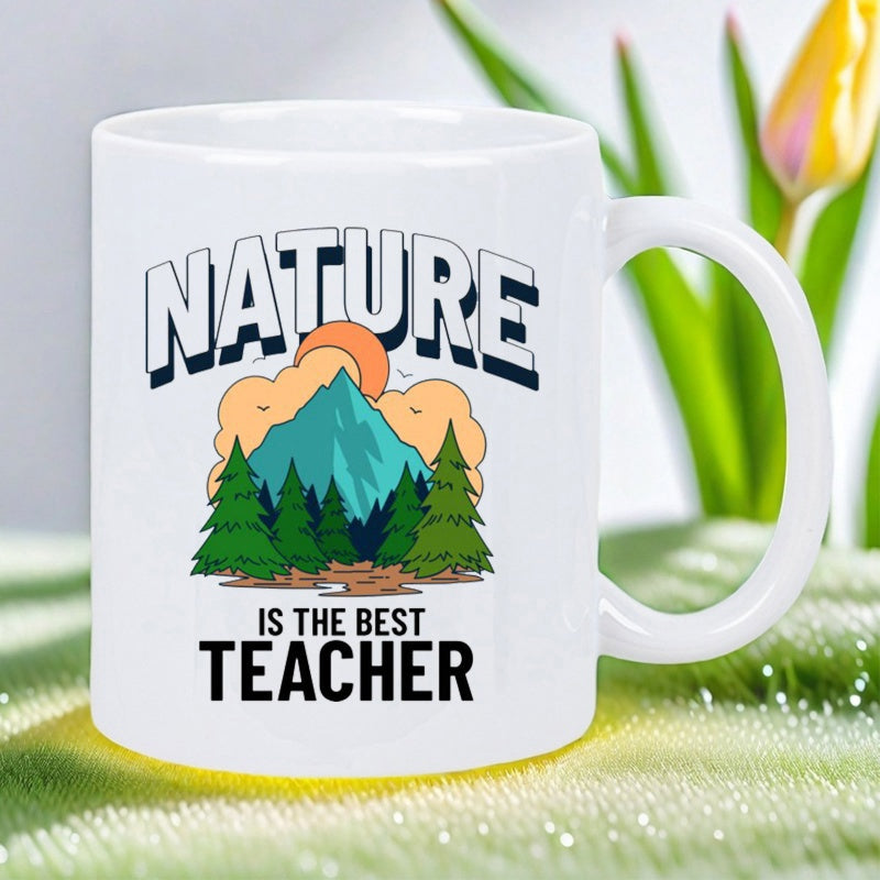 Tailorly White Ceramic 11 oz Mug - Nature Is The Best Teacher Majestic Blue Peak Among Evergreen Trees Beneath Soft Orange Clouds Mountain