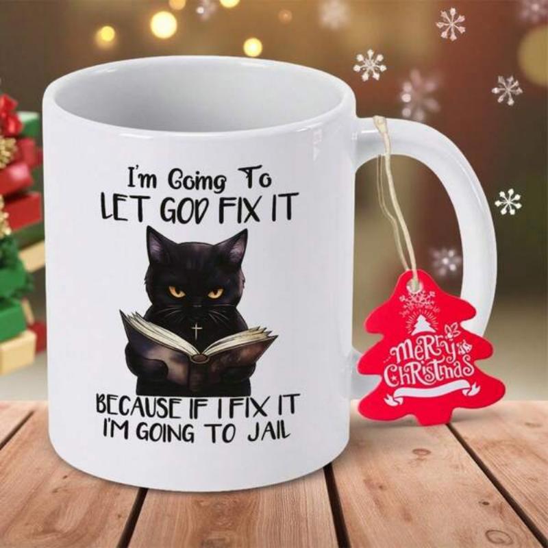 Tailorly White Ceramic 11 oz Mug - Im Going To Let God Fix It Because If I Fix It Im Going To Jail Grumpy Black Feline Character Holding Open Book With Focused