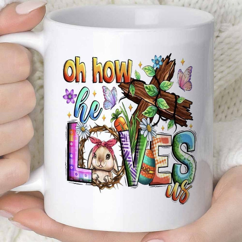 Tailorly White Ceramic 11 oz Mug - Oh How He Loves Us Wooden Cross With Green Leaves Butterflies And An Easter Bunny
