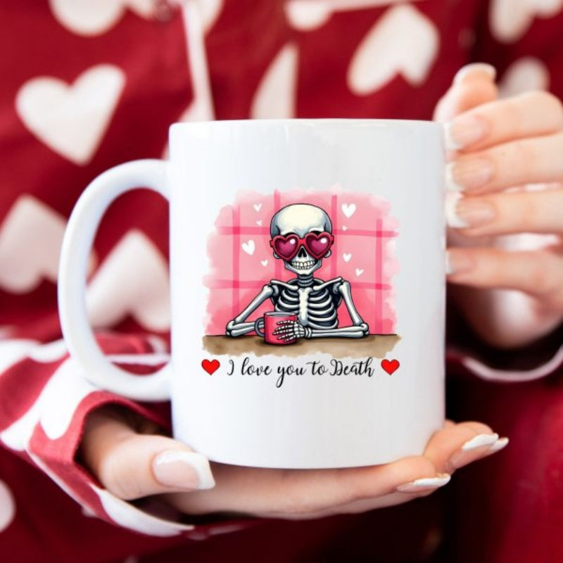 Tailorly White Ceramic 11 oz Mug - I Love You To Death Cute Cartoon Character Wearing Heart Glasses Sipping Coffee At Red Background Skeleton
