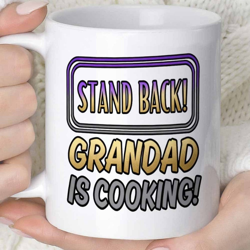 Tailorly White Ceramic 11 oz Mug - Stand Back Grandad Is Cooking Bold Typography Inside A Rounded Rectangular Frame Featuring Gradient Color Style Sign