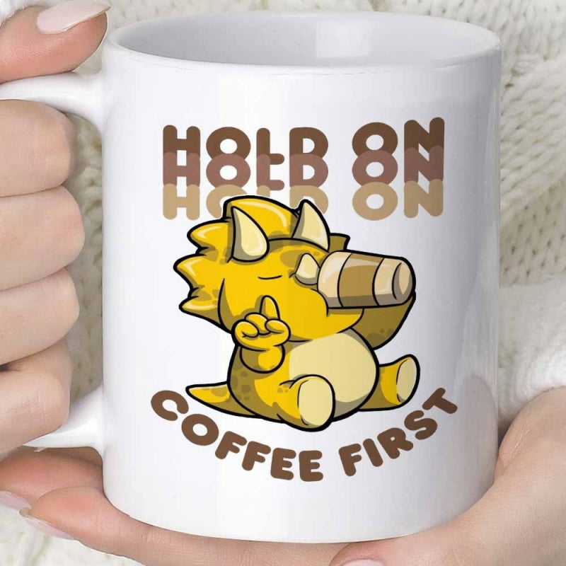 Tailorly White Ceramic 11 oz Mug - Hold On Coffee First Adorable Yellow Cartoon Character Drinking Coffee From A Small Cup Triceratops