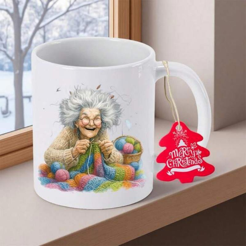 Tailorly White Ceramic 11 oz Mug - Merry Christmas Happy Elderly Woman With Wild Hair Knitting Colorful Yarn Among Balls Of Wool Grandmother