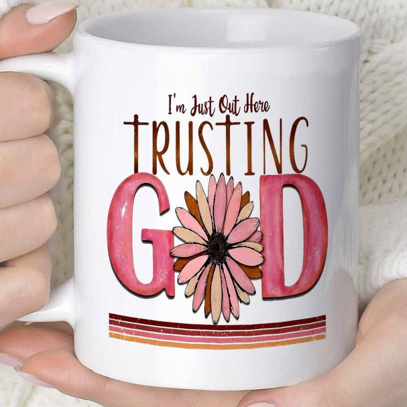 Tailorly White Ceramic 11 oz Mug - Im Just Out Here Trusting God Blooming Daisy Flower Centered Between Large Pink Watercolor Letters Over Retro Stripes Daisy