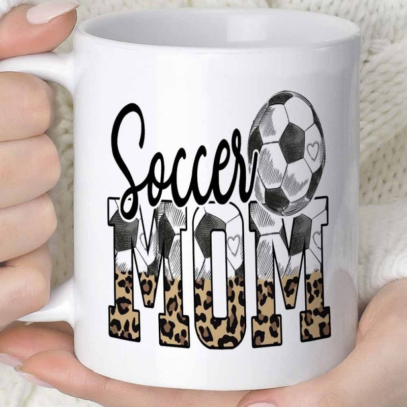 Tailorly White Ceramic 11 oz Mug - Soccer Mom Leopard Print And Soccer Pattern Within Artistic Block Letters Soccer Ball