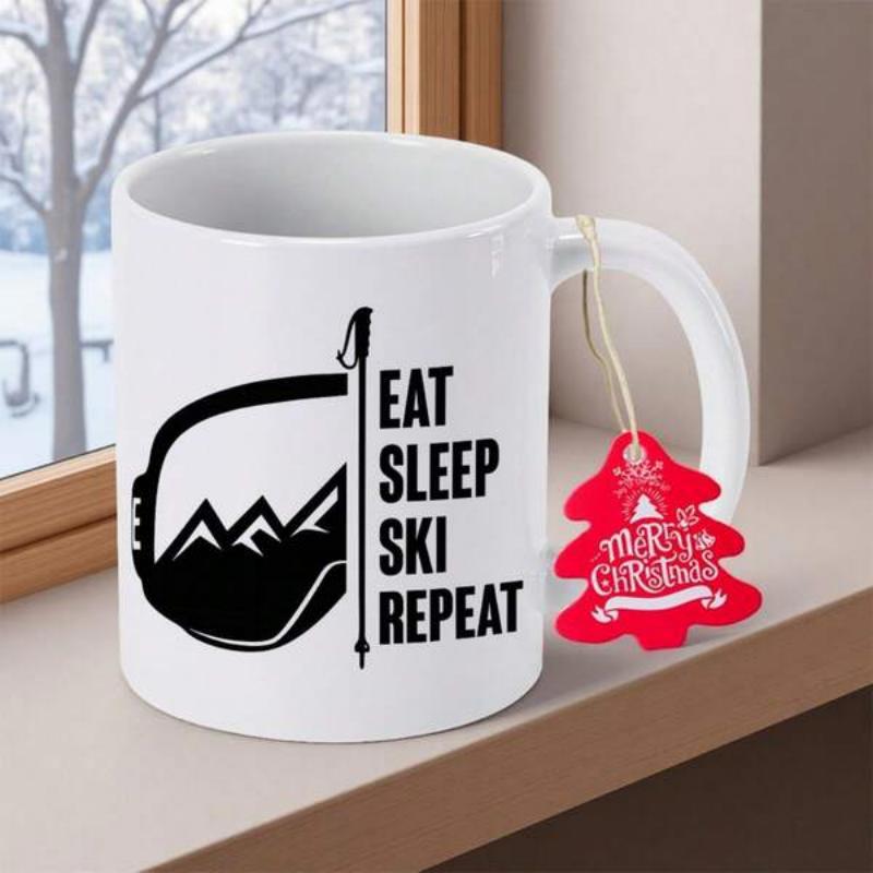 Tailorly White Ceramic 11 oz Mug - Eat Sleep Ski Repeat Minimalist Black Outline Goggles Surrounding Rugged Mountain Ridges Next To Pole Ski