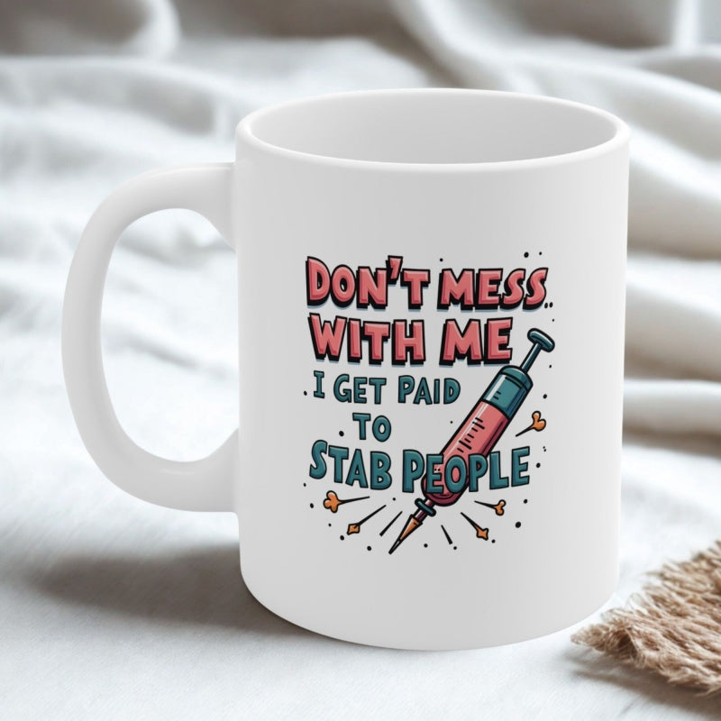 Tailorly White Ceramic 11 oz Mug - Don't Mess With Me I Get Paid To Stab People Cartoon Syringe Filling With Red Liquid Among Dynamic Scattered Sparks Syringe