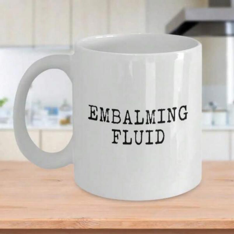 Tailorly White Ceramic 11 oz Mug - Embalming Fluid Sleek White Ceramic Minimalist Vessel Resting Upon A Natural Wooden Surface Mug