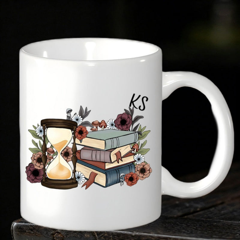 Tailorly White Ceramic 11 oz Mug - KS Vintage Books And Floral Elements Nestled Beside An Elegant Antique Hourglass