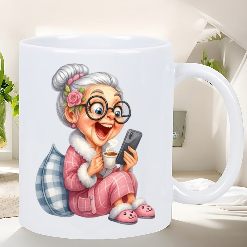 Tailorly White Ceramic 11 oz Mug - Happy Elderly Woman In Pink Robe Enjoying Coffee And Smartphone Grandmother