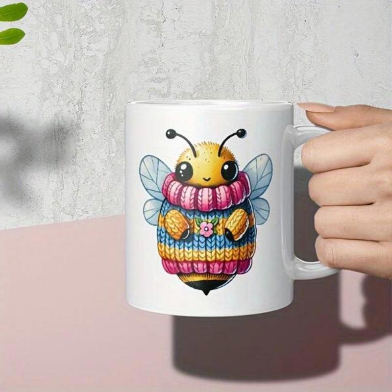Tailorly White Ceramic 11 oz Mug - Adorable Cartoon Bumblebee Wearing A Multi Colored Striped Knitted Sweater Bee