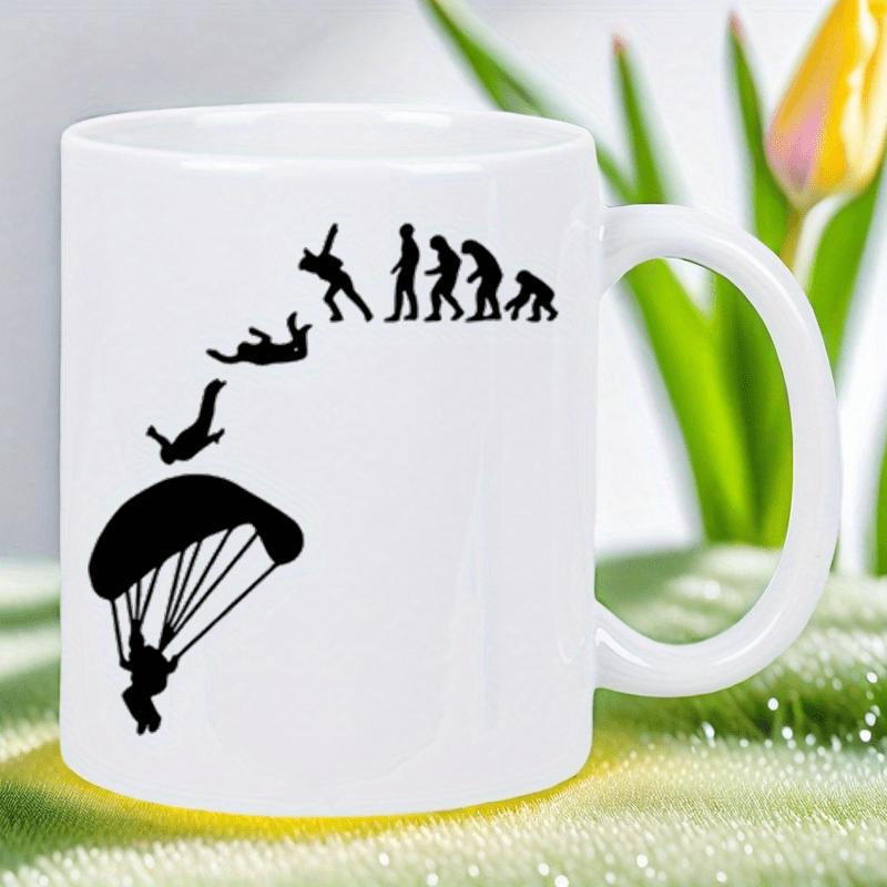 Tailorly White Ceramic 11 oz Mug - Silhouetted Evolution Chart Showing Progress From Primate Into A Skilled Descending Paraglider