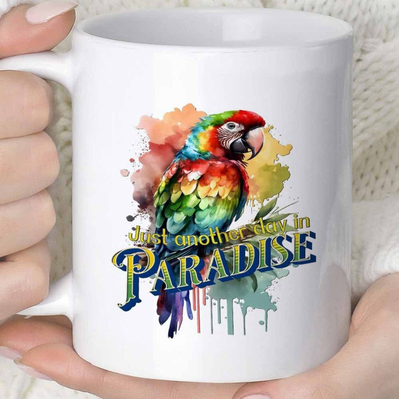 Tailorly White Ceramic 11 oz Mug - Just Another Day In Paradise Vibrant Multi Colored Watercolor Feathers Perched Among Artistic Paint Splashes Parrot