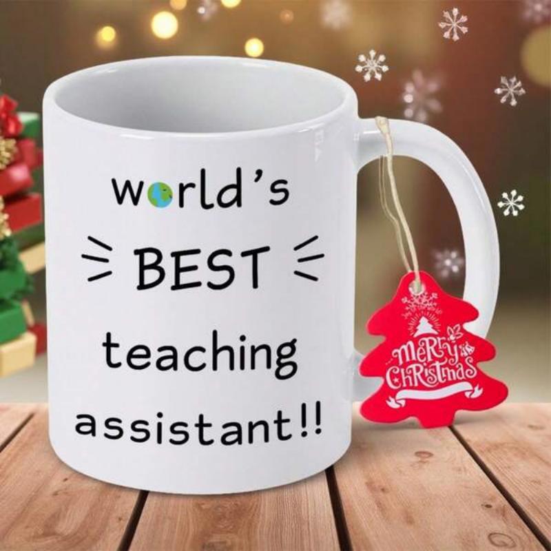 Tailorly White Ceramic 11 oz Mug - Worlds Best Teaching Assistant Minimalist Pure Standing On Rustic Wooden Tabletop Mug