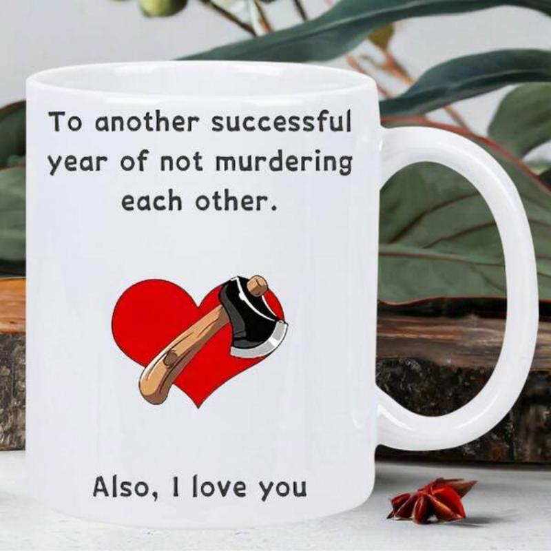 Tailorly White Ceramic 11 oz Mug - To Another Successful Year Of Not Murdering Each Other Also I Love You Vibrant Red Romantic Heart With Sharp Hand Axe In Simple