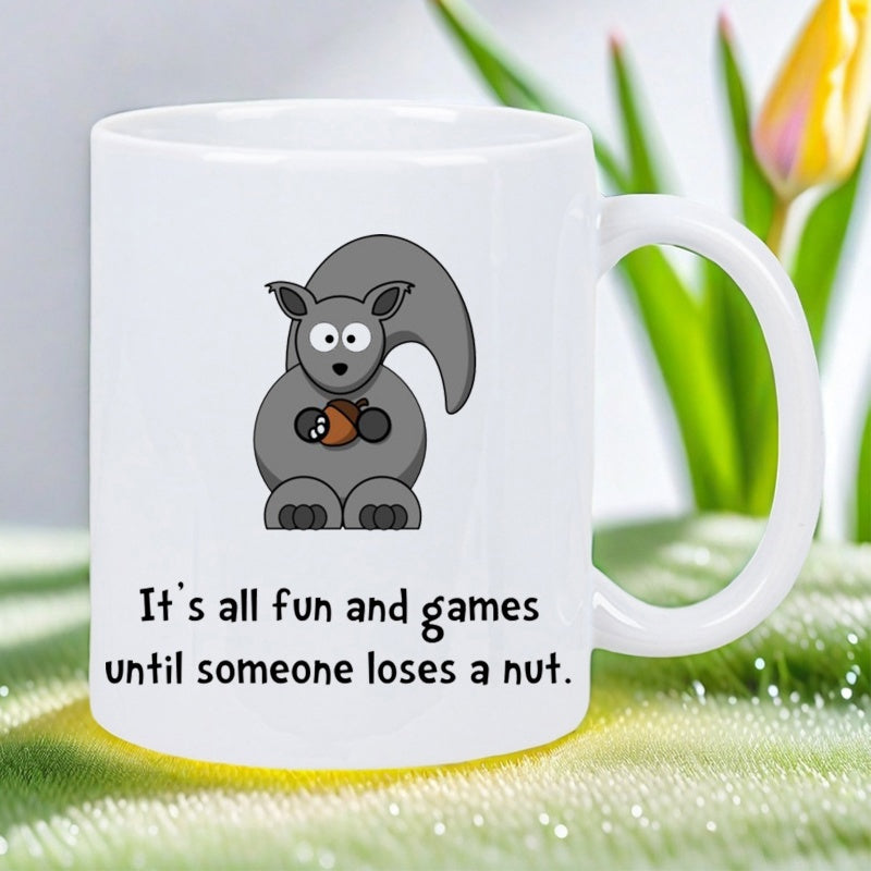 Tailorly White Ceramic 11 oz Mug - Its All Fun And Games Until Someone Loses A Nut Funny Cartoon Gray Squirrel Holding Small Brown Acorn Nut Sitting Squirrel