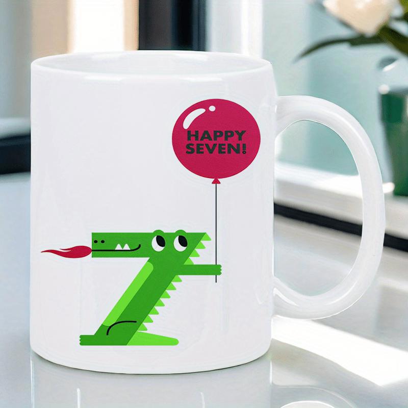 Tailorly White Ceramic 11 oz Mug - Happy Seven Cute Green Number Seven Shaped Creature Holding A Bright Pink Balloon Alligator