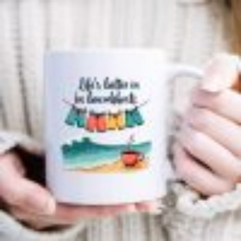 Tailorly White Ceramic 11 oz Mug - Lifes Better In Boardshorts Colorful Swim Trunks Hanging On Clothesline Above A Tropical Coastline Scene