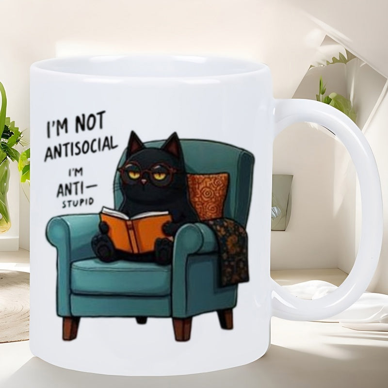 Tailorly White Ceramic 11 oz Mug - I'm Not Antisocial I'm Anti-Stupid Grumpy Black Cat Wearing Glasses Sitting On Teal Armchair Reading Orange Book Cat
