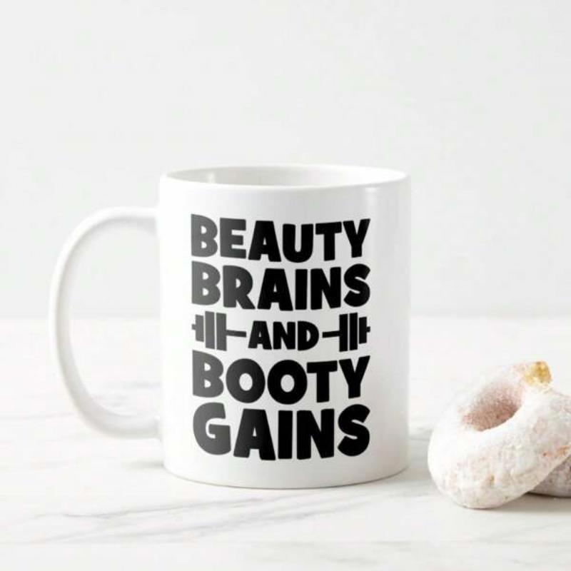 Tailorly White Ceramic 11 oz Mug - Beauty Brains And Booty Gains Modern Black Barbell Graphic Between Stylized Bold Capital Lettering Fitness Quote Barbell