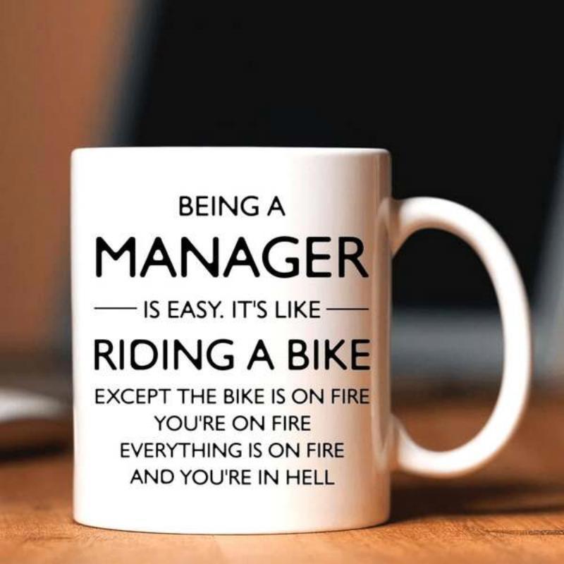 Tailorly White Ceramic 11 oz Mug - Being A Manager Is Easy It Is Like Riding A Bike Except The Bike Is On Fire You Are On Fire Everything Is On Fire And You Are In