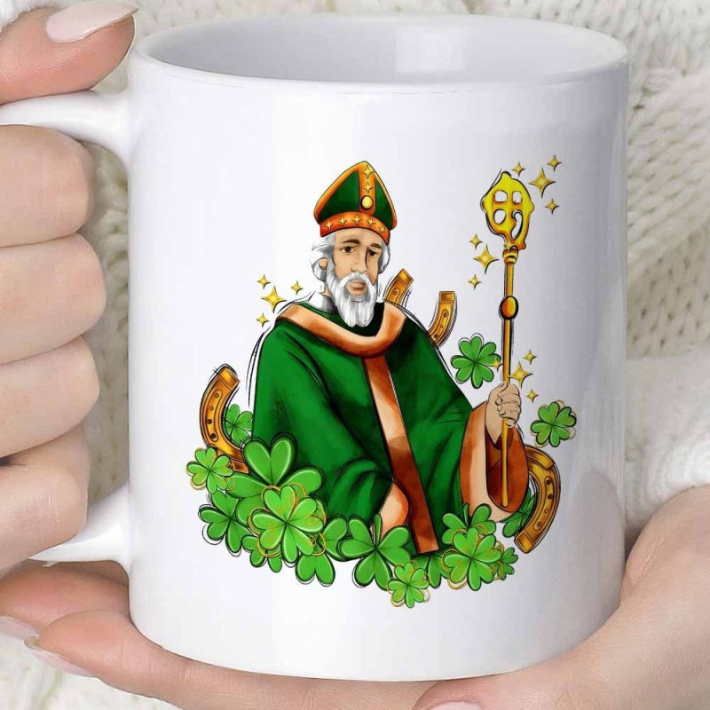 Tailorly White Ceramic 11 oz Mug - Traditional Figure Wearing Green Robes Holding Golden Staff Among Shamrocks Saint Patrick