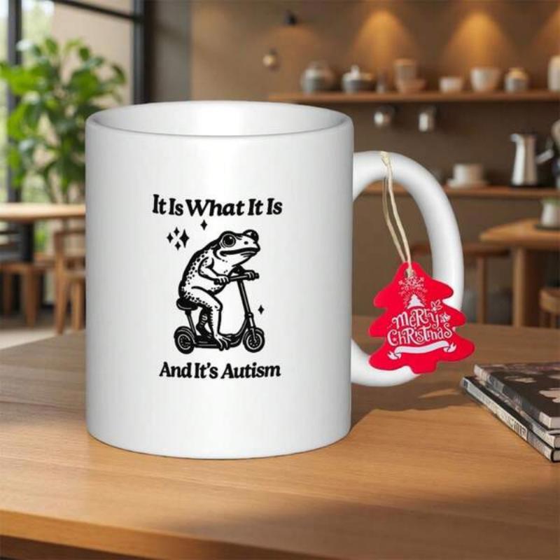 Tailorly White Ceramic 11 oz Mug - It Is What It Is And It's Autism Simple Hand Drawn Sketch Of A Frog Riding A Tiny Scooter Frog