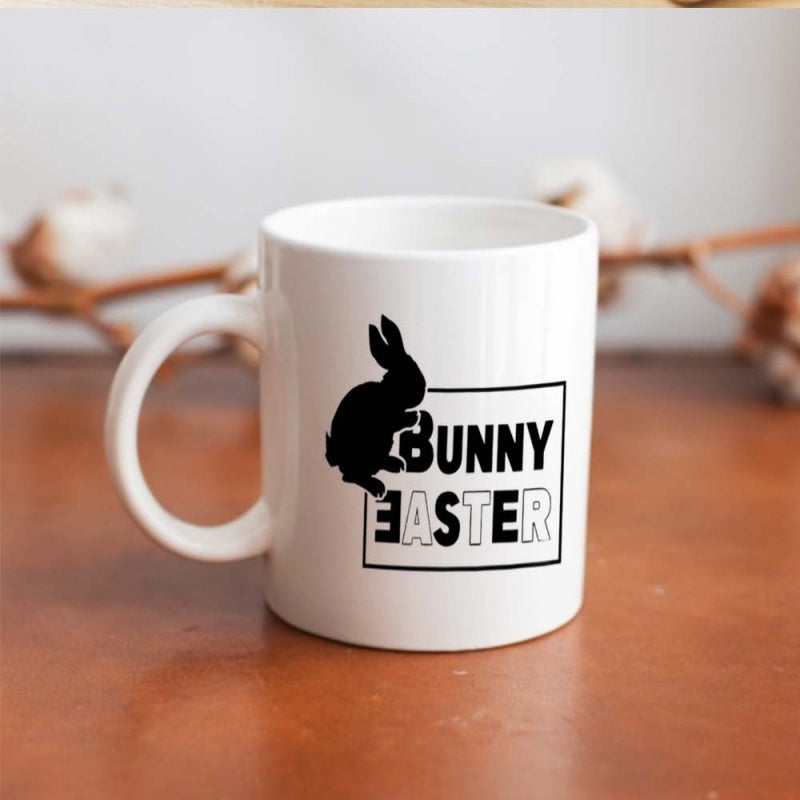 Tailorly White Ceramic 11 oz Mug - Bunny Easter Minimalist Black Rabbit Silhouette Sitting Near Decorative Holiday Themed Typographic Frame Rabbit