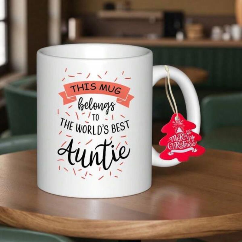 Tailorly White Ceramic 11 oz Mug - This Mug Belongs To The World's Best Auntie Merry Christmas Minimalist White Ceramic With Decorative Pink Ribbon Banner And
