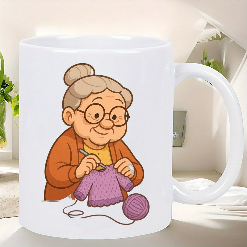 Tailorly White Ceramic 11 oz Mug - Kind Elderly Lady Peacefully Knitting A Purple Sweater From Yarn Grandmother
