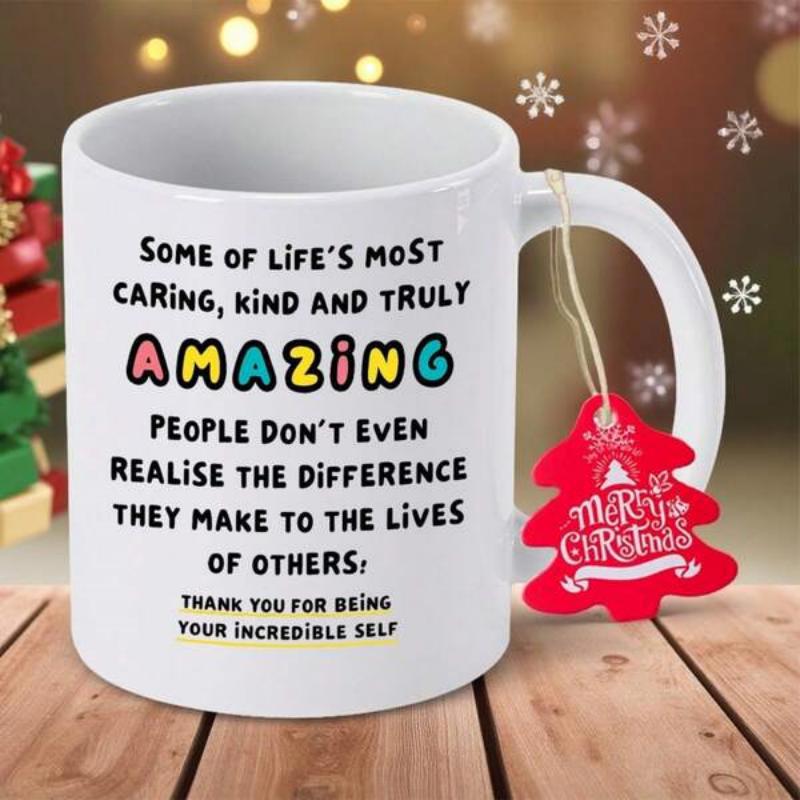 Tailorly White Ceramic 11 oz Mug - Some Of Life's Most Caring Kind And Truly Amazing People Minimalist Ceramic Vessel With A Festive Holiday Tag On Wooden Surface