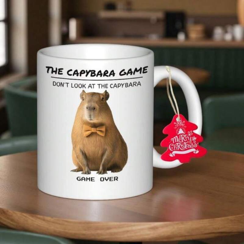 Tailorly White Ceramic 11 oz Mug - The Capybara Game Dont Look At The Capybara Game Over Sitting Peacefully Wearing A Stylish Bowtie Among Simple Text Elements