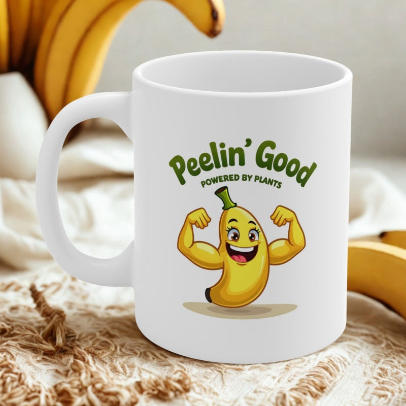 Tailorly White Ceramic 11 oz Mug - Peelin Good Powered By Plants Strong Cartoon Fruit Showing Muscular Arms Flexing Under Fun Slogan Banana