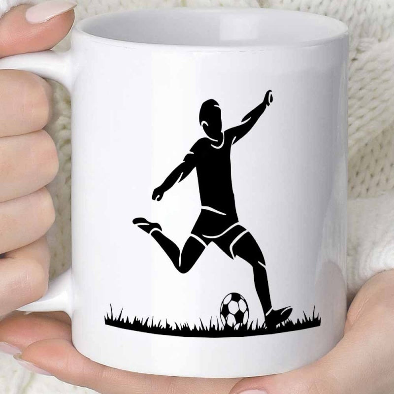 Tailorly White Ceramic 11 oz Mug - Dynamic Silhouette Striking A Ball Over Thick Grassy Ground Soccer Player