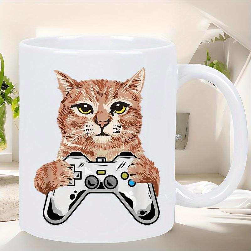 Tailorly White Ceramic 11 oz Mug - Focused Orange Tabby Holding A Game Controller With Gaming Paws Cat