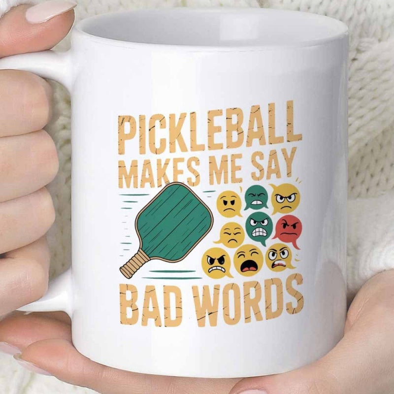 Tailorly White Ceramic 11 oz Mug - Pickleball Makes Me Say Bad Words Distressed Green Paddle With Multiple Colorful Angry Cursing Faces Among Bubbles Paddle