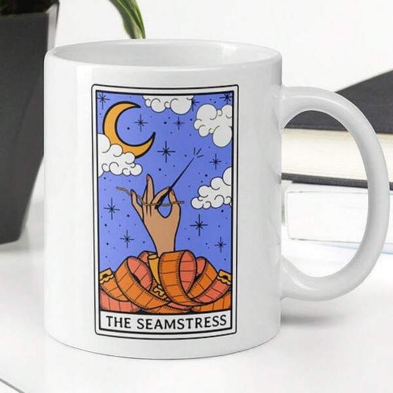 Tailorly White Ceramic 11 oz Mug - The Seamstress Artistic Hand Holding Needle Under Celestial Stars And Moon Seamstress