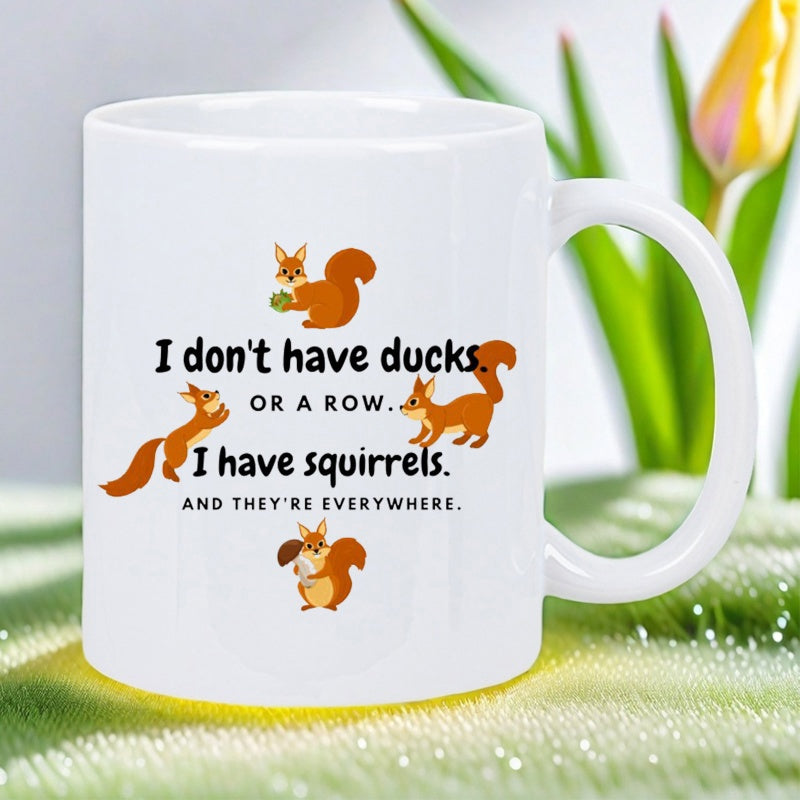 Tailorly White Ceramic 11 oz Mug - I Don't Have Ducks Or A Row I Have Squirrels And They're Everywhere Playful Cartoonish Squirrels Gathering Small Acorns On Plain