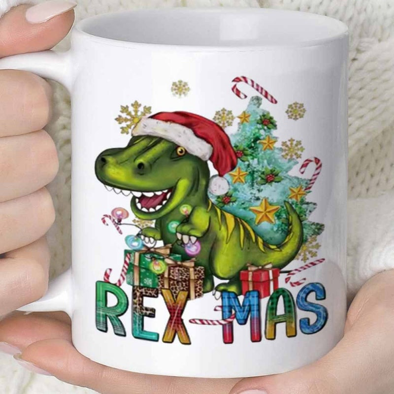 Tailorly White Ceramic 11 oz Mug - Rex Mas Festive Green Dinosaur Wearing Red Santa Hat Beside Decorated Christmas Tree Dinosaur