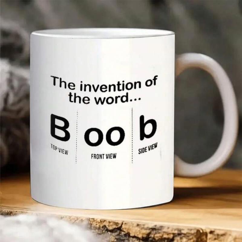 Tailorly White Ceramic 11 oz Mug - The Invention Of The Word Boob Top View Front View Side View Minimalist Bold Black Lettering Style Set Against A Clean White