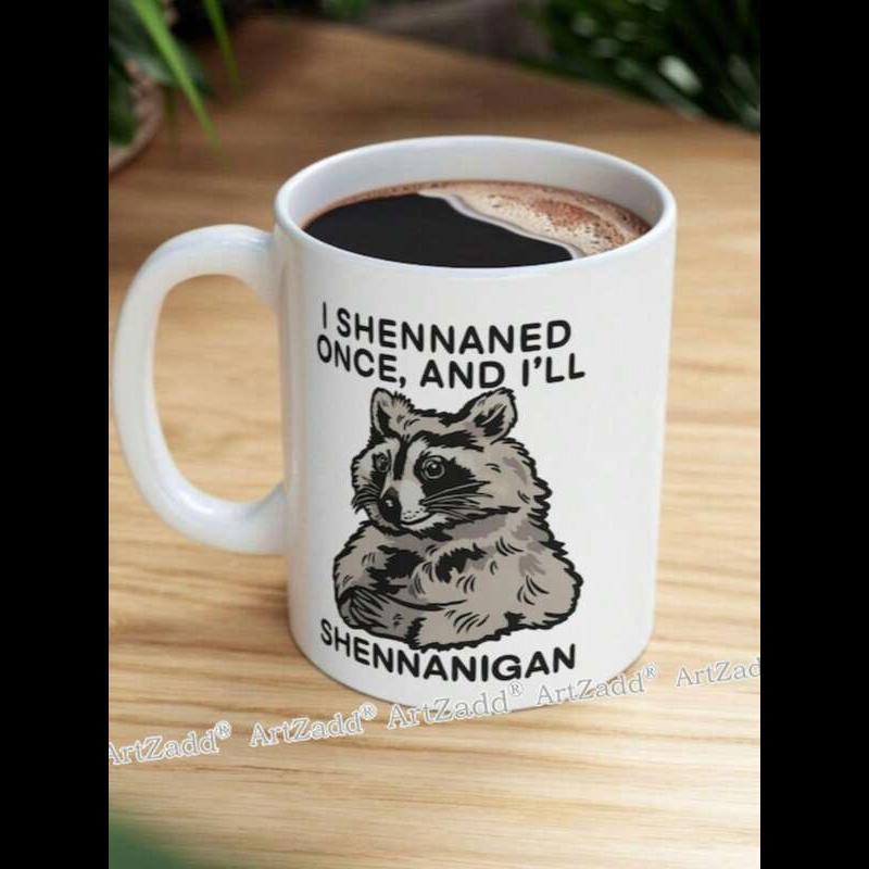 Tailorly White Ceramic 11 oz Mug - I Shennaned Once And Ill Shennanigan Grumpy Hand Drawn Forest Animal Sitting On A Ceramic Raccoon