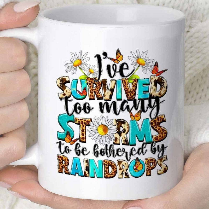 Tailorly White Ceramic 11 oz Mug - Ive Survived Too Many Storms To Be Bothered By Raindrops White Petals With Yellow Centers Among Fluttering Orange Butterflies