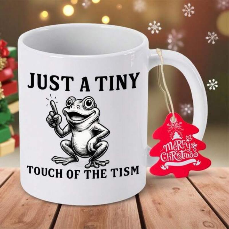 Tailorly White Ceramic 11 oz Mug - Just A Tiny Touch Of The Tism Smiling Cartoon Character Pointing Upward With A Big Friendly Smile Frog