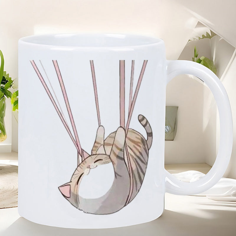 Tailorly White Ceramic 11 oz Mug - Adorable Chubby Tabby Kitten Suspended Peacefully From Thin Pink Lines Cat
